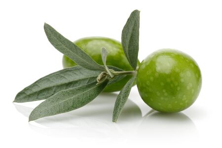 Green olives with leaves isolated on white backgroundの写真素材