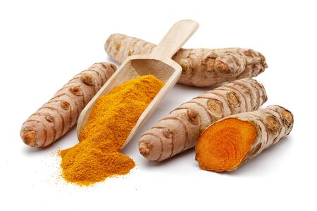 Fresh turmeric and curcuma in wooden spoon isolated on white backgroundの写真素材