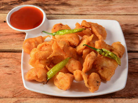 Tasty Egg pakora or fritters is a popular Indian snack, selective focus