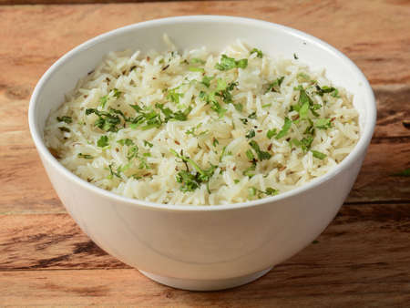 Cumin rice or Jeera Rice is a popular Indian main course item made using Basmati rice flavored with fried cumin seeds and basic spices, selective focusの写真素材