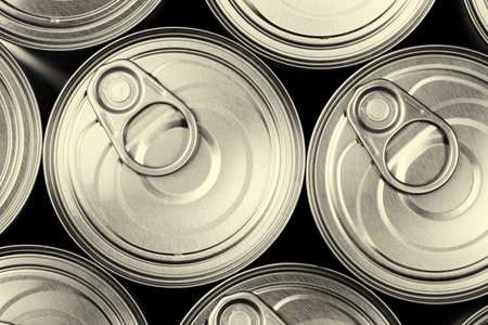 Close, top down view of many easy open metal tin cans in sepia tone