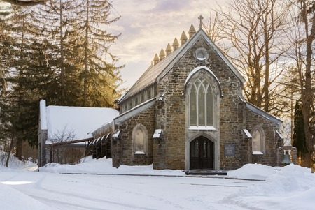 UTICA, NEW YORK - MAR 03, 2019: The building of Silas D. Childs Memorial Chapel erected in 1870 and restored in 1980, located inside Forest Hill Cemetery which a national register place.の写真素材