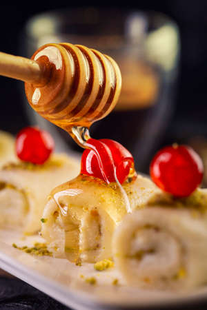 Sweets with white cheese and pistachioの写真素材