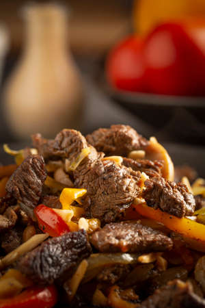 Sliced veal steaks with vegetables and bell pepperの写真素材