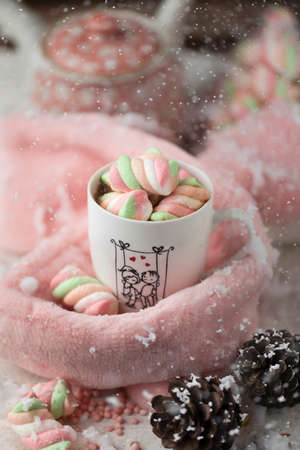 A cup of hot marshmallows in the winterの写真素材