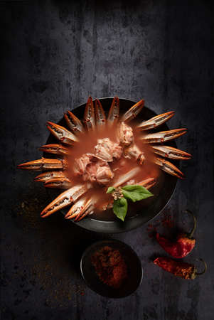 Crab legs soup with a little spice, one of the most delicious seafoodの写真素材