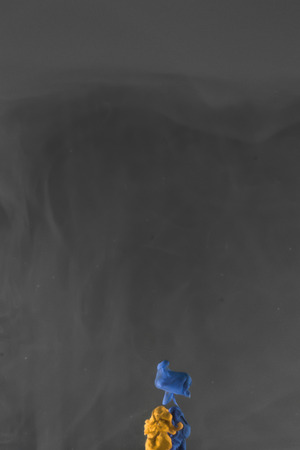 ink dropped in water , shot with nikond d5100 and a 35 mm lens - 3 light sourcesの写真素材