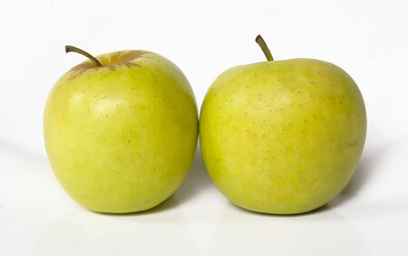 Two Healthy Apple Fruit. Green Apple Isolated on White Backgroundの写真素材
