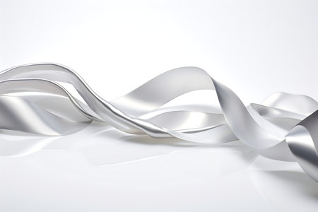 Silver satin ribbon bow isolated on white background.の素材