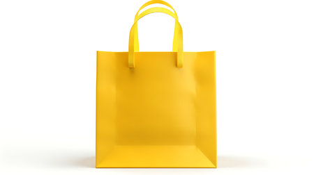 Yellow shopping bag isolated on whiteの素材