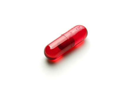 Red pill isolated on white backgroundの素材
