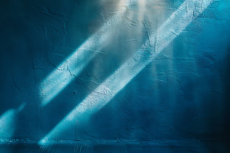 Abstract blue interior with concrete wall and sunlight.の素材