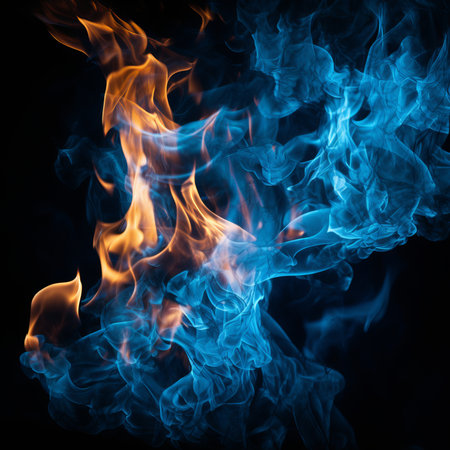 Blue fire flames isolated on black background, blue smokeの素材