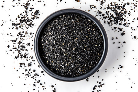 Black ground pepper isolated on white backgroundの素材