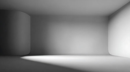 A minimalist, grayscale room featuring a rounded cylinder structure and a sharply defined corner. Light softly illuminates the space, highlighting the simple geometry of the interior.の素材