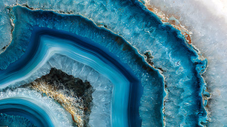 Detailed macro showcasing an azure agate slice. Features layered blue patterns and a textured surface, highlighting the mineral's unique banding and natural formations.の素材