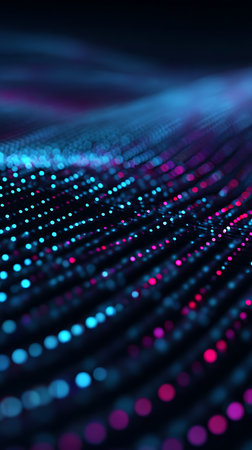 Abstract digital artwork featuring wavy lines formed by blurry and out-of-focus glowing dots. The color scheme comprises primarily of blue and pink hues.の素材