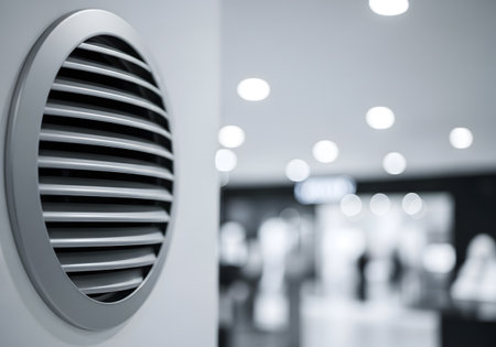 Air conditioner in modern office building with bokeh background.の素材