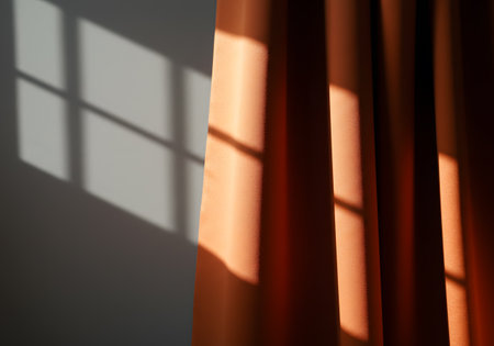 Asphalt road roller working on new road construction site at sunset.の素材