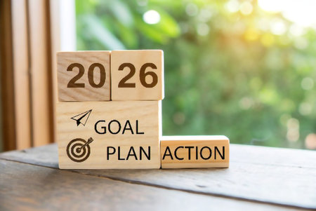 Wooden blocks stacked to represent the year 2026, goal, plan, and action.の素材