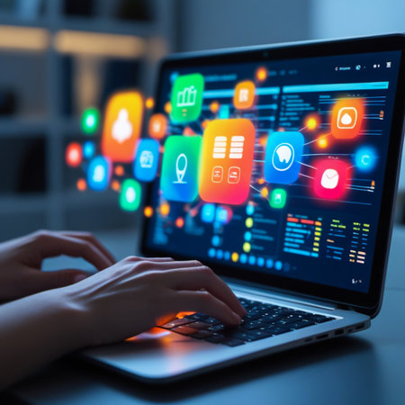 Hands typing on laptop with colorful app icons floating from screenの素材