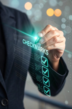 Business professional marking checkmarks on a digital listの素材