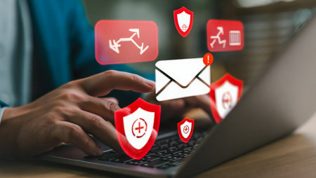 Cybersecurity threats and email protection on a laptop computerの素材