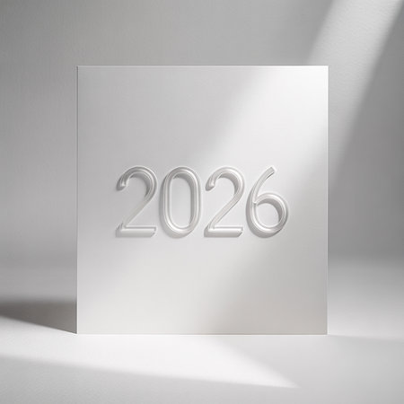 A clean, modern composition featuring the year 2026 embossed on a white plane with soft lighting.の素材