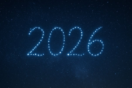 The year 2026 is illuminated with bright blue sparkling lights on a dark starry backdrop.の素材