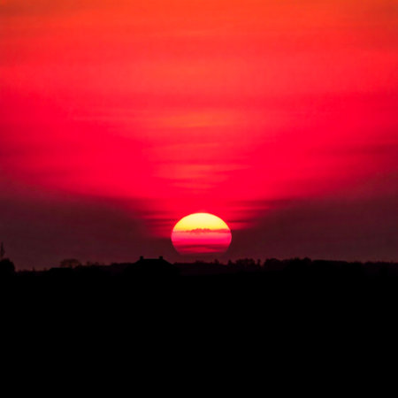Beautiful sunset over the city. Silhouette of the city.の素材