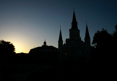 Sun setting behind the St Louis Cathedral in New Orleansの写真素材