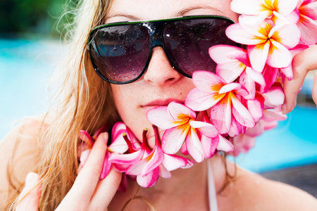 The beautiful lady with flowersの写真素材