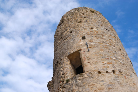 Old stone tower in Dolce Aqua Castle. Liguria. Italyの写真素材