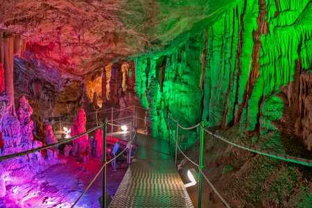 Sfendoni or Zoniana cave on Crete with colorful illuminationの写真素材