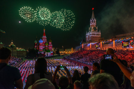 Moscow, Russia - 08.24.2018 - 09.02.2018: Festival Spasskaya Tower of military orchestras on Red Square in Moscow. Fireworks at the end of show.のeditorial素材