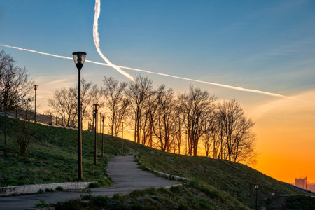 Public city park in sunset light