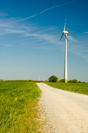 Wind turbines and rapeseed fieldの写真素材