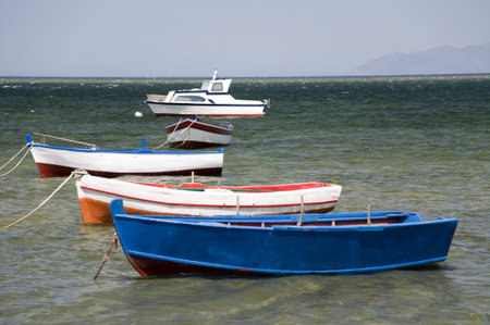 Five boats in the port, Marsala, Sicily, Italyの写真素材