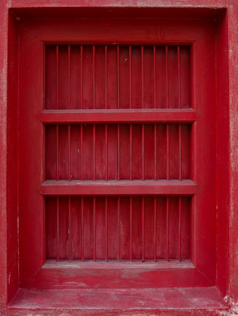 Thai traditional antique  red door in Wat Benchamabophit Dusitvanaram.の写真素材