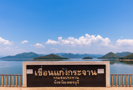 Phetchaburi, Thailand - April 13, 2018: Sign of Kaeng krachan Dam in Thai, The dam is an earth dam and considered multi-purpose,のeditorial素材