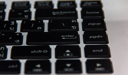 the computer laptop keyboard fot the input text on the documentの写真素材
