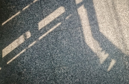 the light and shadow in cement wallの写真素材