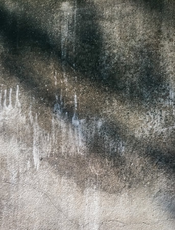 the light and shadow in cement wallの写真素材