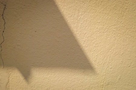 the light and shadow in cement wallの写真素材