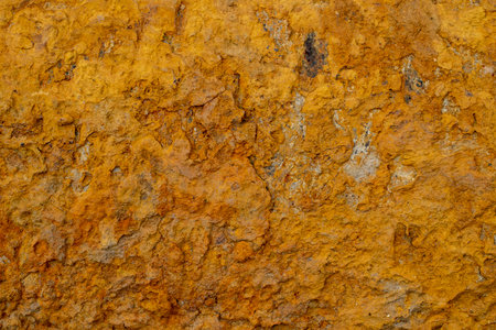 Texture of dry orange clay with cracks.の写真素材