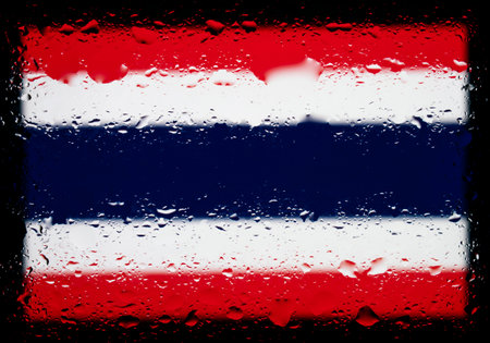 Drops of water on Thailand flag background. Shallow depth of field. Selective focus. Toned.の写真素材