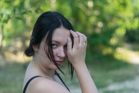 Close up retro portrait of a young Caucasian girl.の写真素材