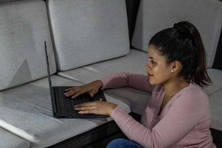 Young woman working from her laptop at homeの写真素材
