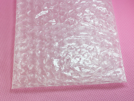 Shockproof material - Air Bubble Sheet on pink background