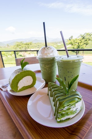 Closed up Green tea cake roll and crepe cake with matcha green tea